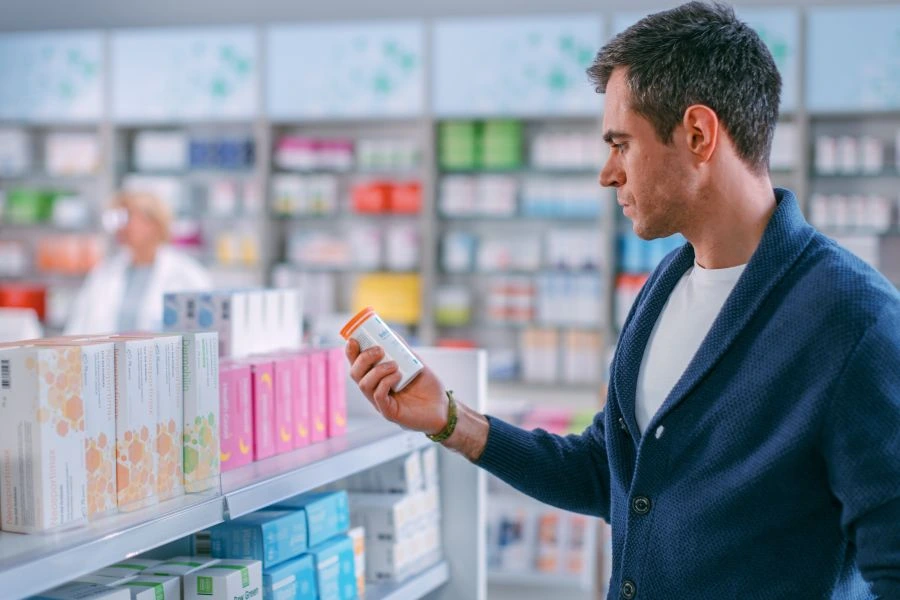 Man buying supplements